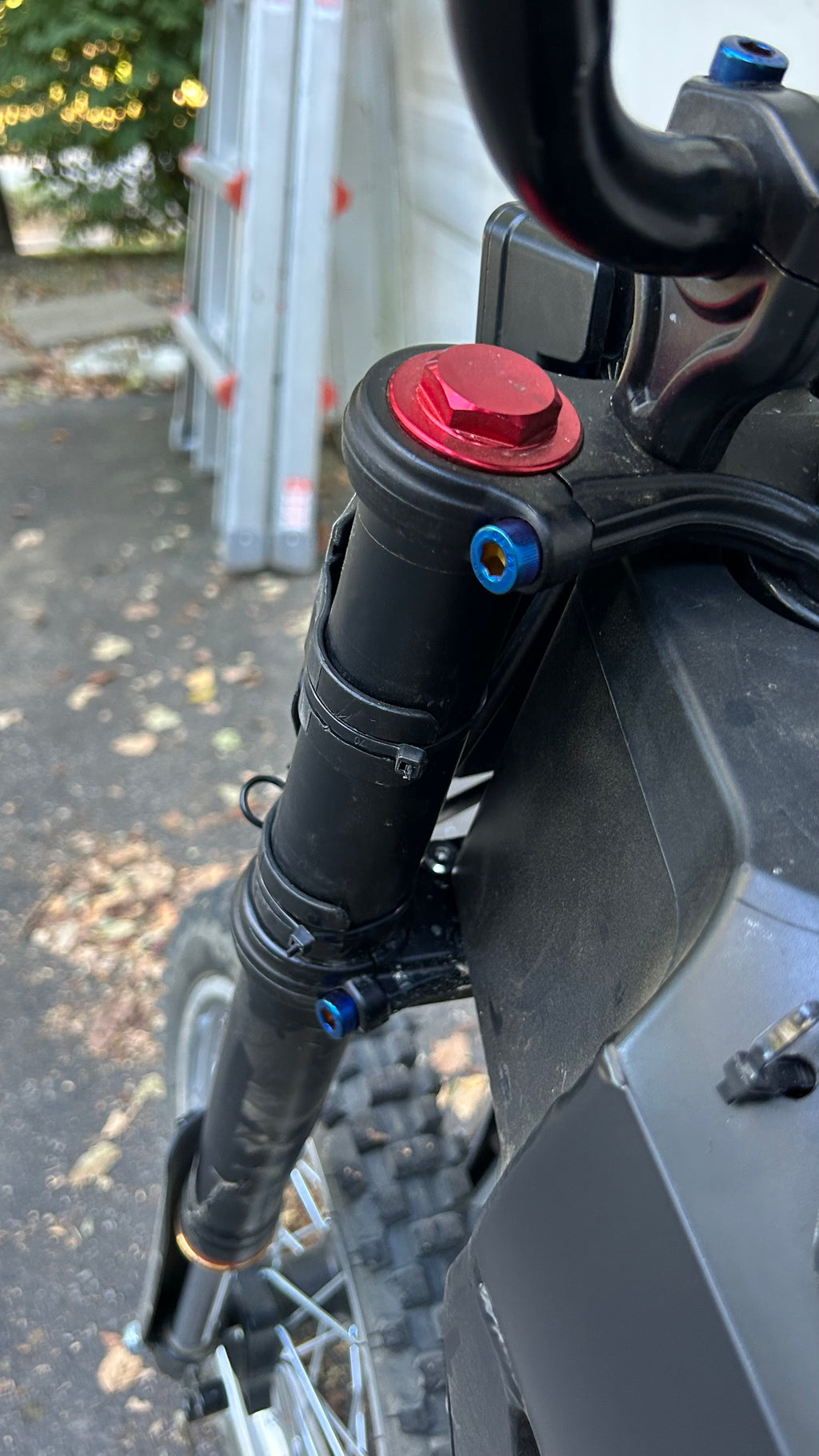 Titanium coated tuttio suspension bolts